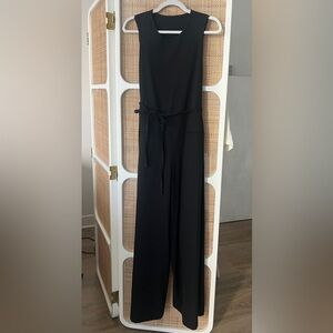 Chic Black Sleeveless wrap Jumpsuit size 2 great condition.